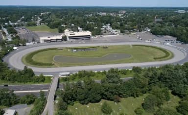 Freehold Raceway sign marking the oldest horse racing track in the United States.